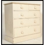 A Victorian painted pine country 2 over 3 chest of drawers. Raised on a plinth base with 2 short