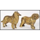 A pair of early 20th century cast brass figures of dogs comprising of a Rough Collie and a bearded