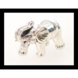 A silver figurine of a bull elephant marked 925 sterling. Weight 20.5g.