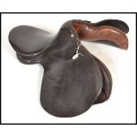 A vintage 20th century good quality leather horse saddle appearing in good condition. The saddle