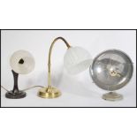 A collection of three vintage / retro 20th Century lamps to include a bakelite pedestal goose-neck