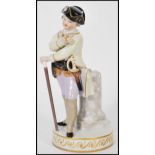 A Meissen porcelain figure modelled after Schonheit as a boy officer stood before marble pillar in