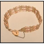 A hallmarked 9ct gold heart padlock bracelet. Weighs 5.9 grams.