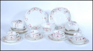 A 19th century Victorian William Alsager Adderley & Co ' Spray ' Pattern china tea service