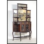 An Edwardian mahogany mirror back sideboard Chiffonier. The base with shaped end shelves and central