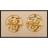 A pair of 14ct gold Chinese cufflinks of circular form having lucky character marks. Weighs 6.3