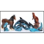 A group of vintage ceramic animals to include Poole pottery, Blue Mountain pottery, Beswick horse