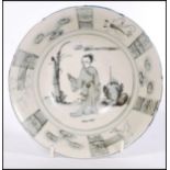 A 19th century Chinese bowl having decoration of maiden with plants and geometric borders. Six