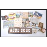 A collection of vintage 20th century cigarette cards loose and in albums to include Wills, John