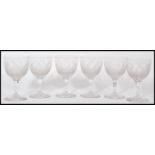 A set of 6 French 20th century cut - acid etched wine glasses. Each bowl with decorated