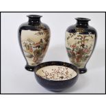 A group of three early 20th century matching Japanese Kutani ware to include a pair of vases with