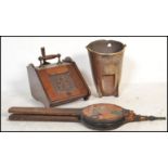 A 19th century Victorian mahogany fireside compendium coal  box having carved front panel and turned