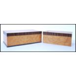 A pair of 20th century satin birds eye maple crossbanded jewellery boxes being of rectangular form
