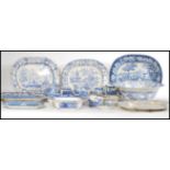 A selection of late 19th/ early 20th century blue and white ceramic wares to include a selection