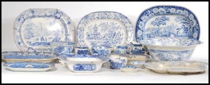 A selection of late 19th/ early 20th century blue and white ceramic wares to include a selection