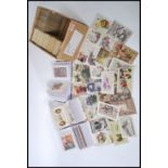 Postcards - 1400 vintage Greetings issues, loose and in three albums. Used/unused. Mostly very