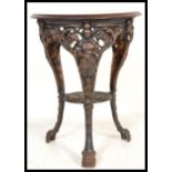 A vintage commemorative cast iron Britannia pub table with solid wood top. The table for The Royal