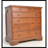 A 17th Century 2 over 4 chest of drawers with frieze panelled sides, having peg joints, swing