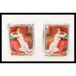 A pair of mens silver cufflinks having square enamelled panels depicting pictures of a nude female