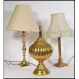 A collection of 3 20th century / contemporary brass table lamps to include a large bulbous