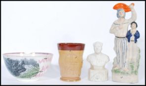 A selection of 19th century ceramics to include a Staffordshire figurine group of sailor and boy,