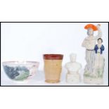 A selection of 19th century ceramics to include a Staffordshire figurine group of sailor and boy,