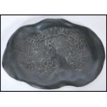 A 19th Century Art Nouveau cold cast metal pin dish, of shaped form with female bust to the centre