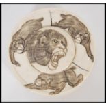 A 19th century Chinese ivory roundel pot depicting decoration of monkeys. The lidded pot of circular