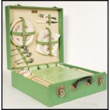 A vintage 20th Century green vinyl cased Brexton picnic set, all original contents within to include
