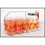 A vintage 20th century French glass mulled cider set consisting of jug and six tall glasses in