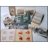 A collection of 20th century postcards being of topographical interest together with albums of black