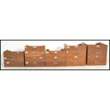 A group of approx eighteen oak early 20th ecntury shop haberdashery cabinet drawers of varying
