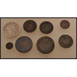 A collection of 19th and 18th Century coins to include an 1791 Edinburgh half penny, two 1799 George