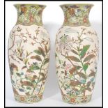 A pair of 19th Century Meiji period large Japanese Satsuma vases each of cylindrical bulbous form