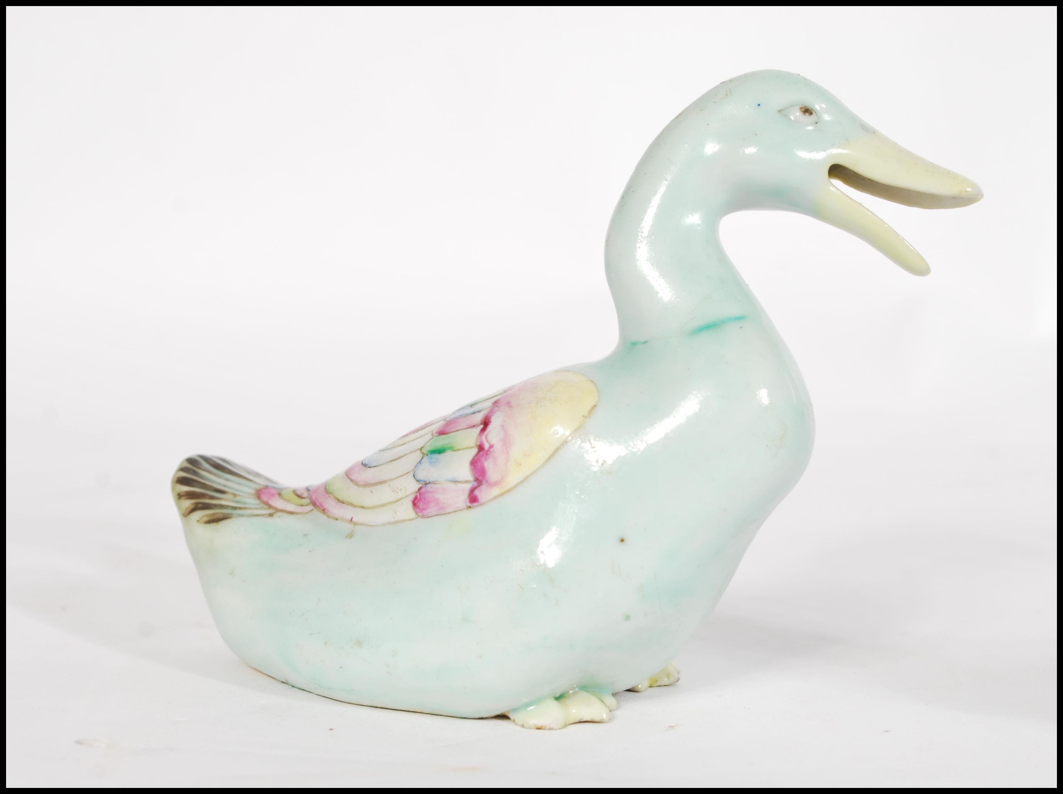A pair of 19th century Chinese Ming style pottery ducks, each polychrome decorated predominantly - Image 4 of 4