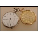 Two vintage pocket watches one being a silver cased American pocket watch with white enamel face