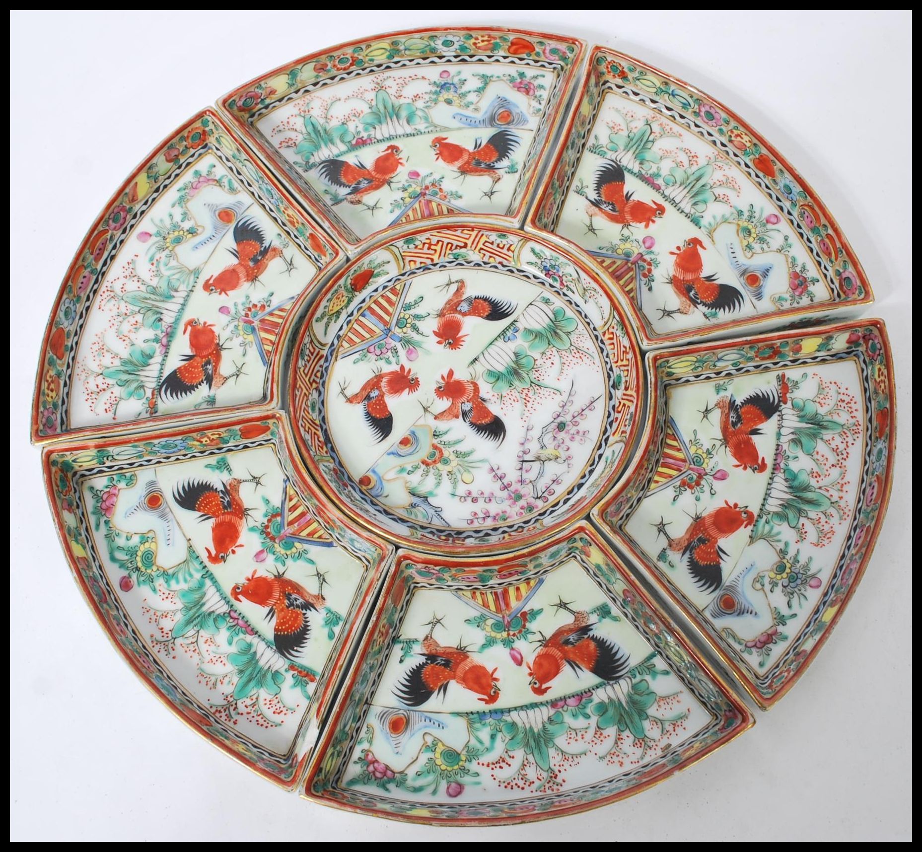 An early 20th century Chinese porcelain horderves sectional set of serving dished housed within a - Image 2 of 4