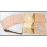 A collection of eight books of Gold leaf sheets together with with a tool for the application of