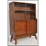 A vintage retro teak wood sideboard / credenza / display cabinet, sliding glass doors to the the top