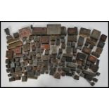 A collection of early 20th century advertising wooden backed copper and metal printing blocks, the