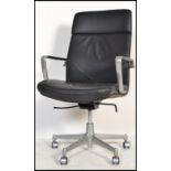 A vintage 20th Century black leather and chrome swivel executive office chair by Kusch and Co