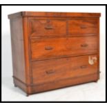 A 19th Century Victorian flame mahogany chest of drawers, two short drawers over two long with