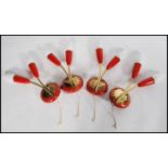 A set of four mid vintage retro 20th century 1960's wall lamps with twin red tulip glass sconces