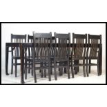 A stunning 20th Century Chinese large refectory dining table and chairs dining suite, consisting