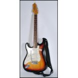 A vintage Westfield left handed Stratocaster type Pro Series electric guitar having an abalone