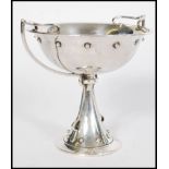 An early 20th century silver hallmarked trophy cup centerpiece by Mappin and Webb. Hallmarked for