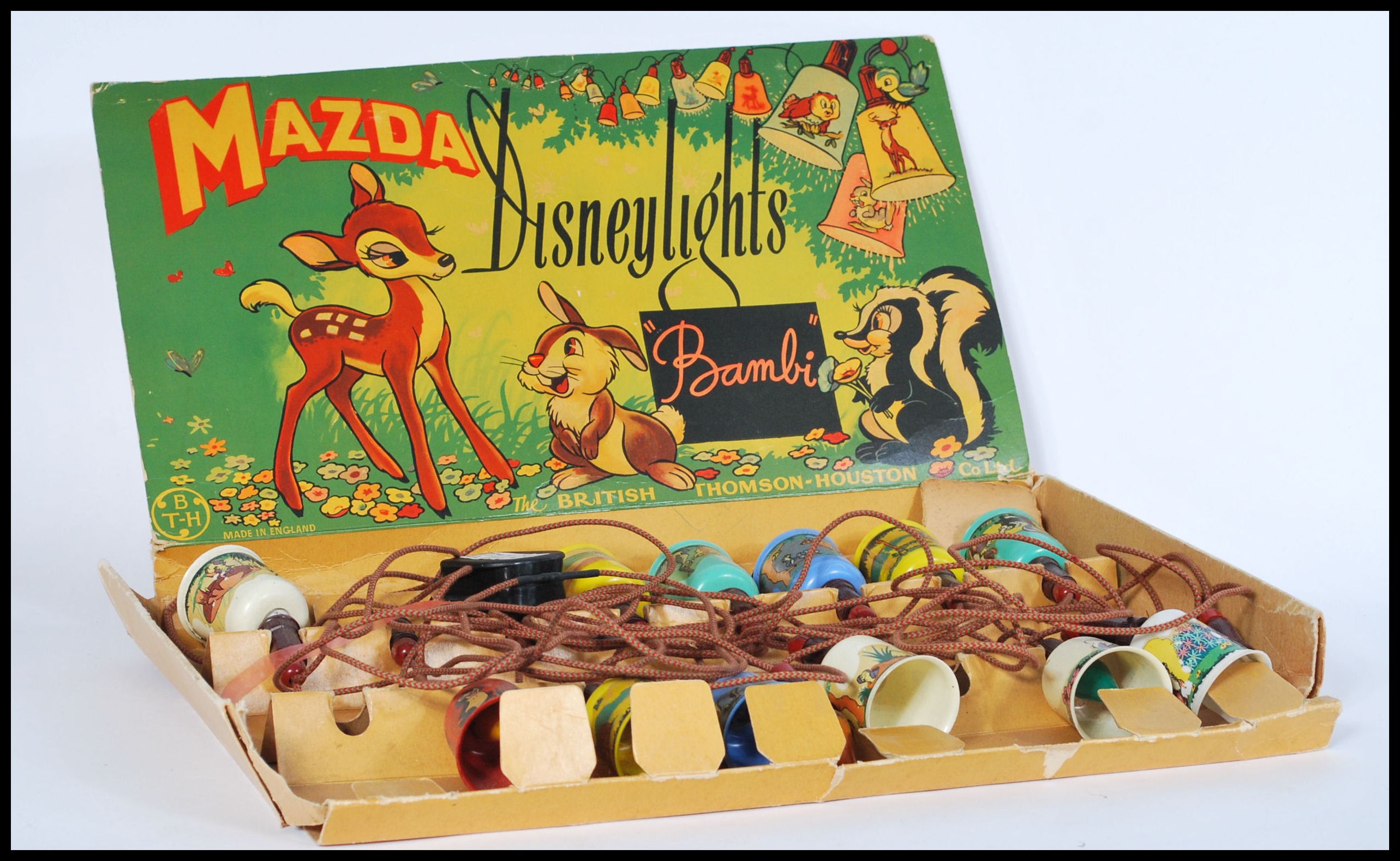 A set of vintage mid 20th century Mazda 'Bambi' Disney lights on a corded wire with multi coloured