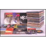 A large collection of vinyl records of various genres to include Dance, Pop, Various Artist