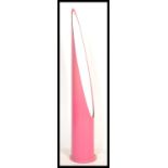 A large unusual pink  20th century lipstick mirror. Floorstanding of conical form with mirror