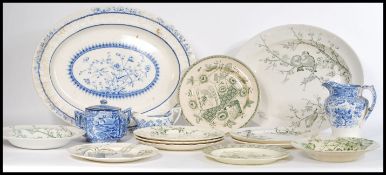 A collection of transfer printed ceramics dating from the 19th Century to include platters, plates